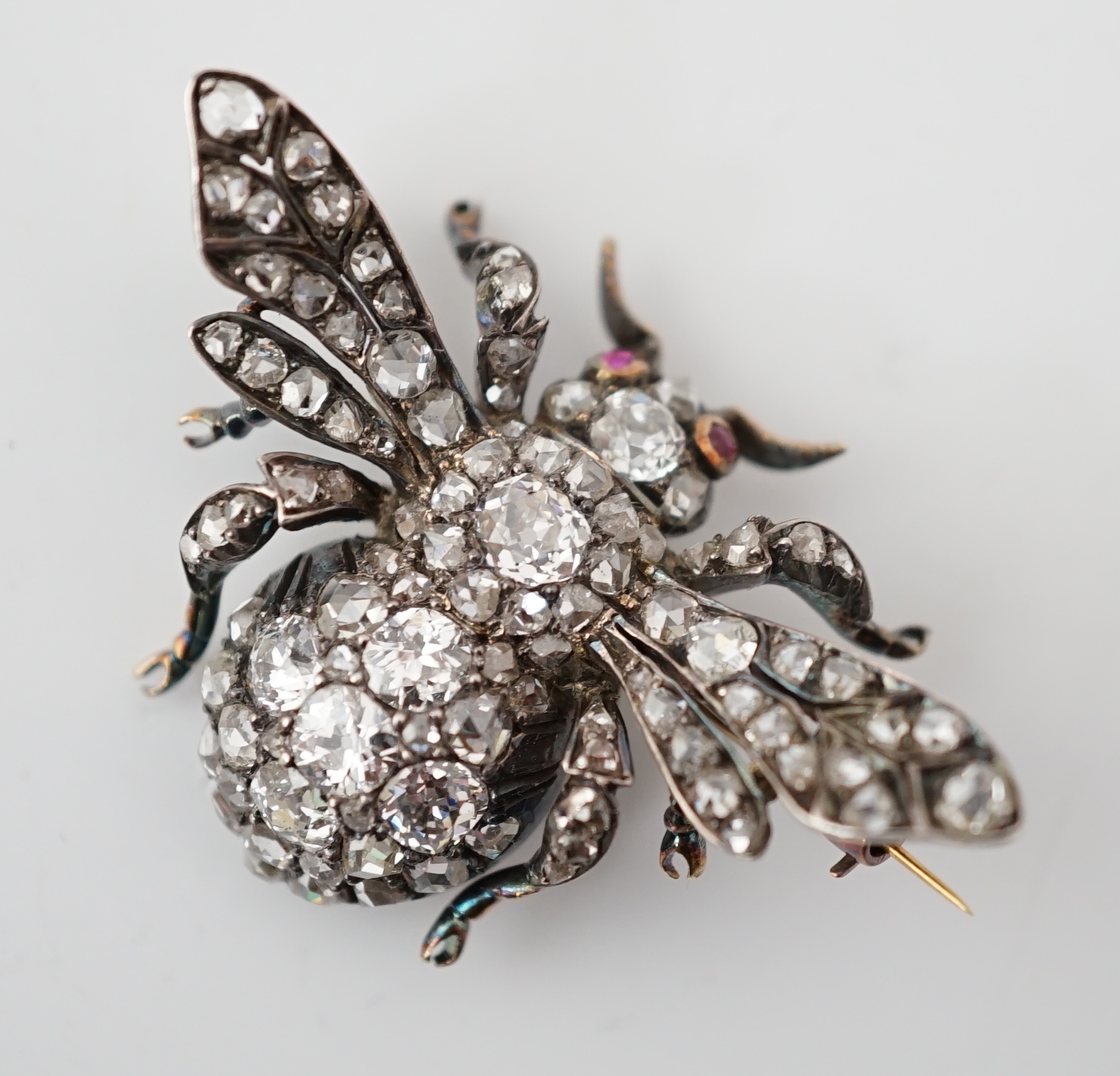 A Victorian gold, silver and diamond encrusted bee brooch